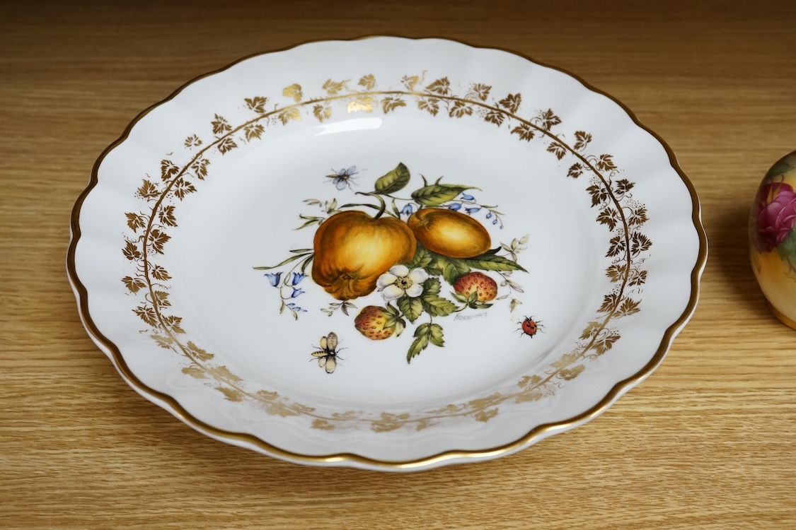 Three pieces of Worcester comprising a fruit printed and painted dish, bears signature Freeman, floral jug and a miniature tyg hand painted with a bird, largest 24cm in diameter